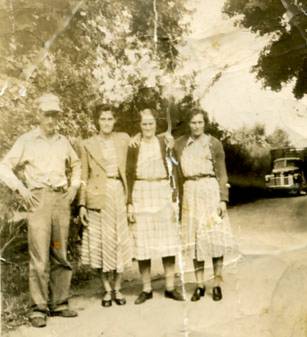 JohnLucilleGrannyFlorence.jpg
From left to right; John Johnson, Mrs. Lucille Hayden, Carrie Johnson and Florence Holmes. John, Lucille, and Florence were Carrie's children.  Courtesy of Lesa Long [email]ladygwenhwyvar@hotmail.com[/email]
