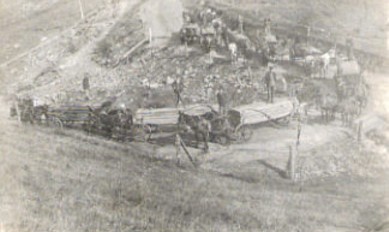 Cleveland - Cleveland Lumber Yard
Horse drawn wagons of lumber crossing mountain from Lebanon to Cleveland to be shipped by rail.   Russell County, VA.
Courtesy of a person who wishes to remain unknown.
