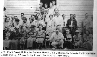 houk14.jpg
Left to right, front row.  #2, Len Houk, #7, Drewey Houk; 2nd row, #4, Martha Houk Trent, #6, Hattie Houk Bourne; 3rd Row.#2 Steve Roberts, #4 Arthur Houk.  Courtesy of Thom Houk.
