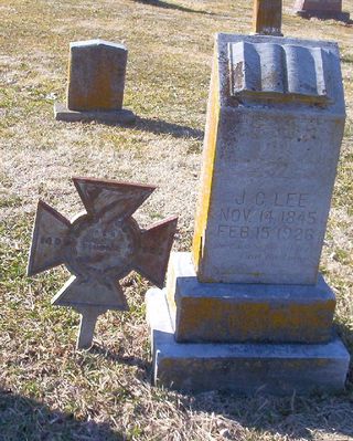 J. Calvin Lee
This grave marker for J. Calvin Lee shows the Confederate Iron Cross.
