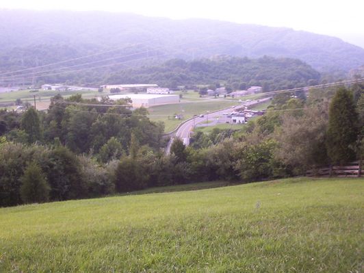 000_0729.JPG
This is an overlook of the scene of the principal battle of Saltville, October 2, 1864.  Note the earthworks at the edge of the tree line about middle of the image.  Photo by Jeff Weaver, June 2005.
