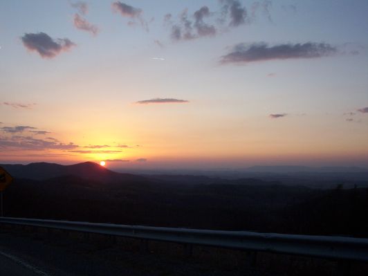 100_1265.jpg
This is a photo of sunset over Clinch Mountain taken from Skull's Gap, between Konnarock and Chilhowie, VA.  Taken 6:25 p.m., March 12, 2006 by Jeff Weaver.
