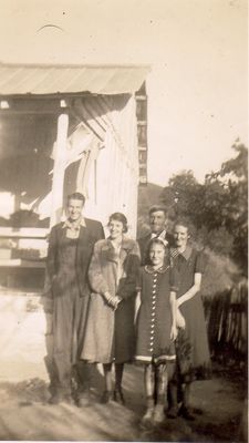 413.jpg
Left to right, Paul Phipps, Ola Mae Phipps Neaves, Sue Lee Phipps (front), Benjamin Franklin Phipps, and Cora Lee Richardson Phipps.  Photo 1938, Weaver's Ford, Ashe County, NC.
