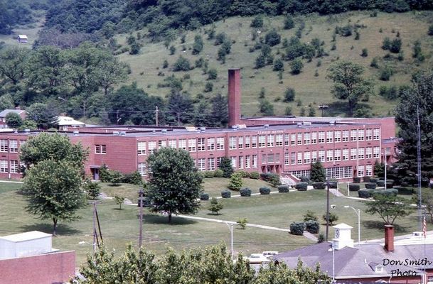 Saltville - R. B. Worthy High School
R. B. WORTHY HIGH SCHOOL  /  SALTVILLE, VA.  /  JUNE 1973  /  200MM TELEPHOTO FROM HILL BEHIND MADAM RUSSELL CHURCH.  Courtesy of Don Smith [email]dsmith1043@comcast.net[/email]
 
