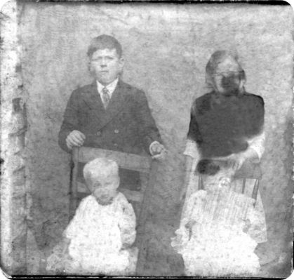 Perkins Relatives
These may be Perkins relatives, I had a friend try and restore this as it was very damaged.  Courtesy of Cathy Bell [email]cjbell47@goldenwest.net[/email]
