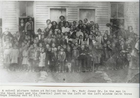 HeltonSchool(ca1915-20).jpg
My great-grandfather Wade Jones Sr. is one of the teachers in this photo.  He is on left with little black bowtie near edge of window.  I don;t know when the picture was taken but from looking at him I would suggest 1915-20, maybe up to 1925.  I don;t know any of the others.  Courtesy of Danny Miller [email]millerd@fuse.net[/email]

