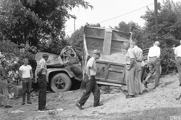 JULY22RUNAWAYDUMPTRUCK0868693.jpg
AUGUST 1968- DUMP TRUCK LOADED WITH SAND LOST BRAKES ABOVE OVERLOOK ON HWY 107 AND CAME INTO THE INTERSECTION WITH HWY 91...CROSSED THE ROAD AND WENT UP JOE VERNON'S DRIVEWAY...DEMOLISHED TWO VEHICLES IN THE DRIVEWAY AND THE DUMP TRUCK. TRUCK DRIVER INJURED.
 Courtesy of Don Smith [email]dsmith1043@comcast.net[/email]
