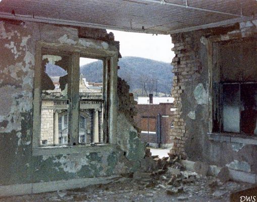 JULY24MGSJAN1980701.jpg
THIS IS WHAT THE MATHIESON GENERAL STORE LOOKED LIKE FROM THE INSIDE ON THE SECOND FLOOR JUST BEFORE IT WAS DEMOLISHED IN JANUARY OF 1980.
 
THE WEST SIDE FRONT CORNER BEGAN TO LOSE BRICKS AND FINALLY THE HOLE OPENED UP. THE STORE HAD BEEN CLOSED FOR SOME TIME. WORK HAD ALREADY LEVELED THE OLD SUPER X / IGA MARKET THAT HAD OPENED IN NOVEMBER OF 1955.
 
THE WALLS WERE SOLID BRICK...THREE WIDE. THEY BUILT IT WELL IN 1894.
 
Courtesy of Don Smith [dsmith1043@comcast.net[/email]
