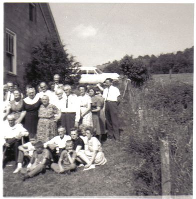 Perkins Family Group
Here is a group of Perkins relatives at Kathleen or Winnie Perkins' home years ago.  I hope someone can help me with dates and who they all are.  Courtesy of Cathy Bell [email]cjbell47@goldenwest.net[/email]

