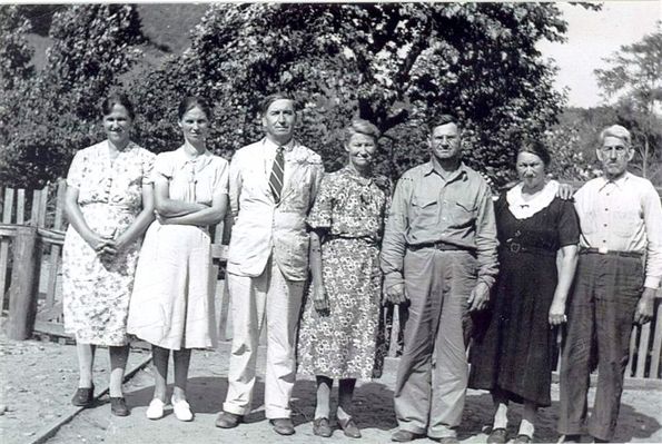 LewisFamily.jpg
Lewis family in 1940.  From left:
   Bertha Lewis Gentry  1902-1966
   Bessie Lewis Houck   1900-1990
   Henry Lewis  1892-1969
   Genealia (Nealie) Lewis Elliott Guest  1890-1975
   Jacob Harvey Lewis 1887-1963
   Emmer Lewis Bumgardner  1885-1967
   George Lewis-father of the above

Courtesy of Judy Lenderman [email]rel1@bellsouth.net[/email].

