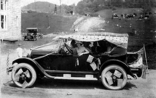 Saltville - Willys Knight Car on the 4th of July
JULY  4th  IN  SALTVILLE,  VA.  /  CIRCA  1925



THE  CAR  IS  A  1924  WILLYS  KNIGHT  COUNTRY  CLUB  (DELUXE  TOURING.)
 
THE  PICTURE  WAS  TAKEN  AT  A  JULY  4th  CELEBRATION  IN  SALTVILLE,  VA.  CIRCA  1925.
 
THE  FIRST  NATIONAL  BANK  IS  IN  THE  BACKGROUND.
 
WILLYS  KNIGHT  WAS  MANUFACTURED  BY  OVERLAND  FROM  1914  TO  1933.
 
THE  CAR  WAS  OWNED  BY  JOHN  CAMPBELL  WHO  LIVED  ON  EASY  STREET.
 
THE  YOUNG  LADY  DRIVING  IS  IRENE  ROGERS  WHO  ALSO  LIVED  ON  EASY  STREET. 
 
THE  PHOTOGRAPHER  IS  UNKNOWN  BUT  WAS  PROBABLY  C.  L.  TOTTEN,  TOM  TOTTEN'S  DAD,  WHO  HAD  A  PHOTO  SHOP  ACROSS  THE  STREET  AT  THE  TIME.  Courtesy of Don Smith [email]dsmith1043@comcast.net[/email]
 

