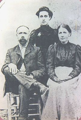 McCluremillard.jpg
This is a picture of Millard F. McClure.  He was the son of Henry Samuel McClure and Sarah "Leah" Howell.  The two ladies are; Mecy Blevins (standing) and Easter Blevins.  They were the daughters of Alfred Blevins and Margery Sheets. All from Silas Creek, Ashe County.  Courtesy of [email]pamiam12@aol.com[/email]
