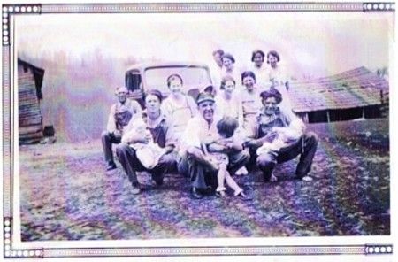 Sexton Family
This is a picture of the Sexton family at the homeplace.

From left to right in front; Troy Sexton (father), Charlie Fred  
Sexton holding baby, Baby unknown, Artie Sexton Weaver, Cone Sexton  
holding girl, Girl unknown, Hattie Sexton Reedy, Ola Clyde (John)  
Sexton Kilby, Dale Sexton holding baby, Baby unknown. In the back  left to right Reber (Ben) Sexton, Virginia (Jennie) Sexton Tucker,  Reva Sexton Hodge, and Martha Warren Sexton (mother).  Courtesy of Amber [email]amberbeth@gmail.com[/email]

