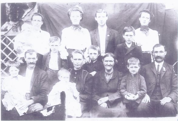 ThompsonClan.jpg
Margaret "Kate" Caudle, Thompson was a sister to William Thomas Caudle who was my Great Grandfather.
Left to Right seated:
James Elihu "Jim" Thompson holding Hettie Thompson, Tines; Margaret "Kate" Caudle, Thompson holding Faye Thompson, Lloyd;Francis "Frankie" Edwards, Thompson, Jim's mother; Joseph "Joe" Thompson; Sidney Thompson, Jim's brother.
Standing: Sidney's wife holding their child; ; Flora Thompson, Norman; Patterson "Pat" Thompson; Lillie Thompson, Gentry. The three boys standing in center row: Harrison; Blaine, & Peter Coy "Pete" Thompson  Courtesy of Nanalee Wrenn [email]nwrenn37@yadtel.net[/email]
