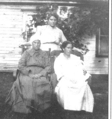 TobithaandMilliePerrySheets.jpg
Seated: Tobitha Ham Perry and daughter Millie Perry Sheets.  Standing: Ettie Sheets, daughter of Millie and Ellis Sheets.  Millie is holding Effie's son Mack Jay Sheets.  Effie was married to Avery Sheets.  Courtesy of Mary Ann Talbott [email]matalbott@seidata.com[/email]
