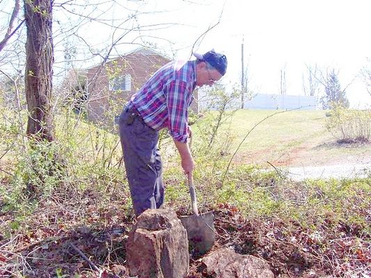 UncoveringtheRev.Warstone.JPG
Lou Kurtz working on uncovering a revolutionary war era grave.
