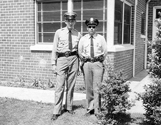 Saltville - Police Department
KYLE ADAMS, LEFT AND CHARLIE NORRIS  /  SALTVILLE TOWN HALL  /  SALTVILLE, VA.  /  1950s.  Courtesy of Don Smith [email]dsmith1043@comcast.net[/email]

 
