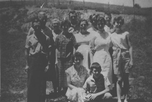 afw1.jpg
Photo taken in 1959.  Left to right: Front row, Mattie Weaver Waddell; Dillard Ray Weaver; second row, Arthur Jackson Weaver, Elzina Mae Weaver Coley; Mary Weaver Blevins, Maxine Weaver Blevins, Hazel Weaver Poole; third row:  Arthur Fred Weaver; Fannie Blevins Weaver; J. Clayborn Weaver; Clarence Edward Weaver; George Edmund Weaver.
