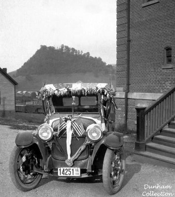 Saltville - 4th of Juky?
M. S. DUNHAM CAR  /  WEST MAIN ST.  IN FRONT OF THE 1905 SALTVILLE HIGH SCHOOL  /  JULY 4th, 1918
 
HIS  GRANDSON,  MYRL,  STILL  HAS  THE  BUNTING  THAT  IS  DRAPED  OVER  THE  AUTOMOBILE  IN  THE  PICTURE.  Courtesy of Don Smith[email]dsmith1-43@comcast.net[/email]
