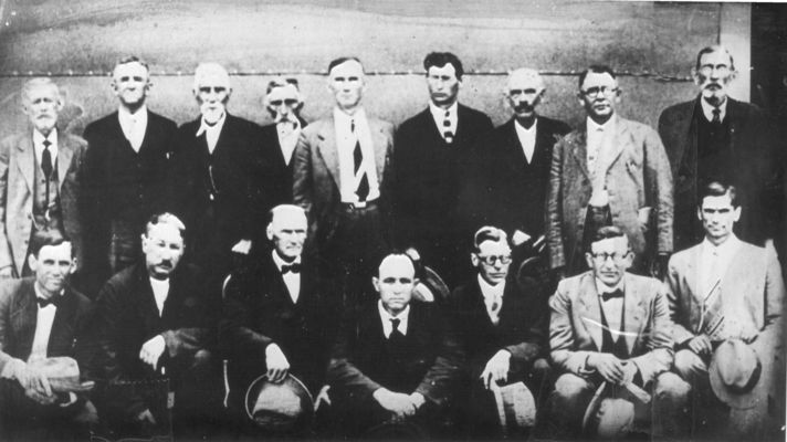 Fox - Primitive Baptist Ministers
This group of Primitive Baptist ministers was taken sometime in the 1920s most likely at Fox Creek Primitive Baptist Church.  Front row, left to right:  Elders Charlie Kilby, Edd Davis, Bob May, Hugh Blevins, George Barker, Bynum H. Blevins, Everett Thompson.  Back row, left to right:  Lic. David Sulllivan; Elders Banks, Eli Lilly, John Cave; Miller, H. B. Miller, Frazier, and Meadows.  Courtesy of Eddie Lyle.
