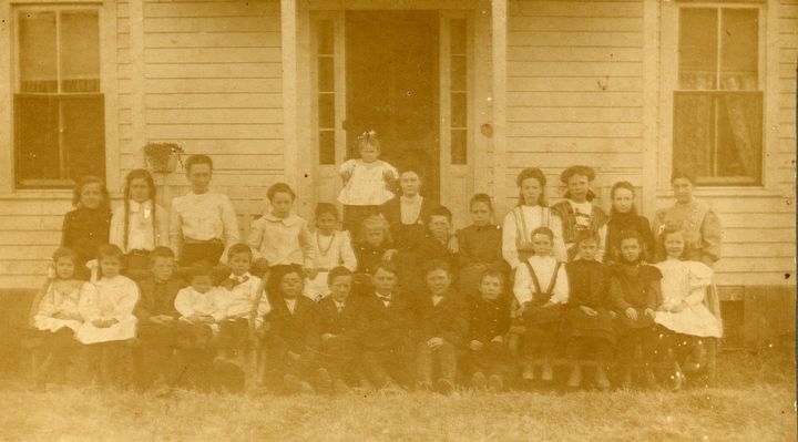 heltonss.jpg
This is a Sunday school photo, probably taken around 1915 if the woman sitting top center with her arm draped over the shoulder of a big-eared son is, indeed, Ada Littlewood Francis (oldest son had stick-out ears). The picture was taken on the front steps of Herbert and Hannah Littlewood's home on Helton Creek.  Courtesy of Emily Kilby.

