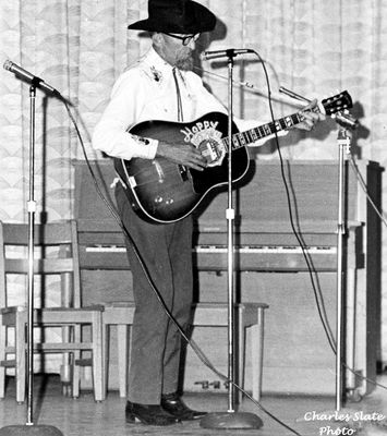 Saltville - Hobart Smith Music festival
"HOPPY" HOPKINS PERFORMS AT THE HOBART SMITH MUSIC FESTIVAL.
 
R. B. WORTHY H. S. AUDITORIUM / SALTVILLE, VA. / JULY 1972
 
CHARLES SLATE PHOTO.  Courtesy of Don Smith[email]dsmith1043@comcast.net[/email]



