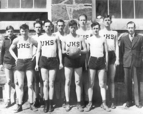 jhs1940basketball.jpg
This photo is of the 1940 Jefferson High School basketball team.  Front Left to right, Eddie Woodie, Parks Colvard, Berman Bare, Billy Joe Gentry.  Back, left to right, Jack Bare, Smith Leak, Cam Bare, Roy Freeman, John D. Weaver.  Coach is Charles Baker Weaver (1914-1966).  Courtesy of Charlie Weaver, Winston Salem, NC.
