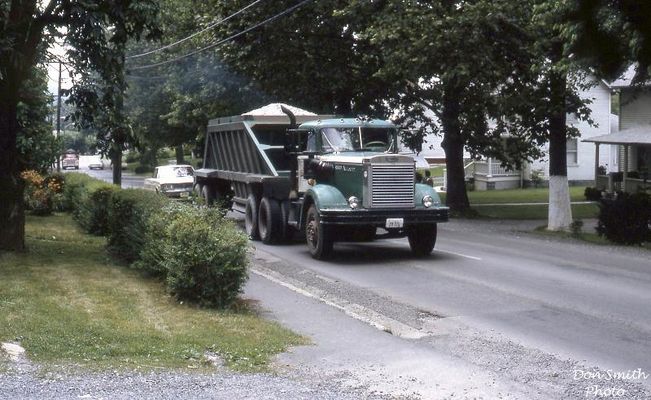 limestonetrucks.jpg
THESE TRUCKS HAULED LIMESTONE TO THE PLANT AFTER THE BUCKET LINE WAS DISCONTINUED IN 1968. THEY HAULED THE STONE FOR FOUR YEARS...UNTIL OLIN CLOSED.
 
PICTURE TAKEN JULY 1971 ON EAST MAIN STREET IN SALTVILLE, VA.
Courtesy of Don Smith [email]dsmith1043@comcast.net[/email]
