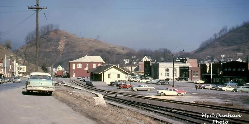 Saltville March 1964
This March 1964 photo shot looking east from Main Street, shows the company store in the center of the shot (red building), the train depot slightly to the left, and the bank further to the left.  Courtesy of Don Smith [email]dsmith1043@comcast.net[/email]
