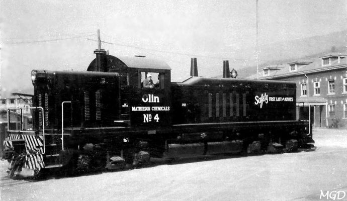 Saltville - Olin Engine No. 4
OLIN MATHIESON DIESEL NO. 4 WAS BROUGHT TO SALTVILLE FROM DETROIT IN 1960.  THE ENGINE HAD 12 CYLINDERS AND 1000 HP. WHEN OLIN CEASED OPERATIONS AT SALTVILLE IN 1972, IT WAS TRANSFERRED TO AN OLIN PLANT IN BEAUMONT, TEXAS.  MYRL DUNHAM PHOTO.  Courtesy of Don Smith [email]dsmith1043@comcast.net[/email]

