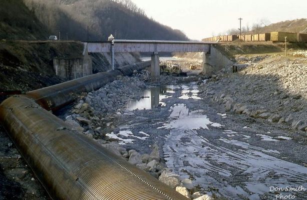 Saltville -Olin River Project
IN 1982, OLIN DID EXTENSIVE WORK TO KEEP MERCURY FROM THE OLD CHLORINE PLANT FROM LEACHING INTO THE NORTH FORK OF THE HOLSTON RIVER AT SALTVILLE.
 
  THE RIVER WAS REDIRECTED THROUGH THE LARGE PIPE AT LEFT SO WORKERS COULD SEAL THE RIVER BANK AT RIGHT TO KEEP THE MERCURY CONTAINED AND OUT OF THE RIVER.  Courrtesy of Don Smith [email]dsmith1043@comcast.net[/email]

