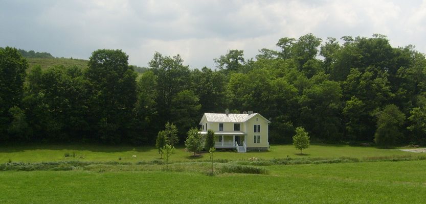 Grassy Creek - Recently Restored House
An example of mountain vernacular architecture is presented ere for your consideration.  This house is fairly typical of the late 19th and early 20th century farm house style.  Photo by Jeff Weaver, June 26, 2007.
