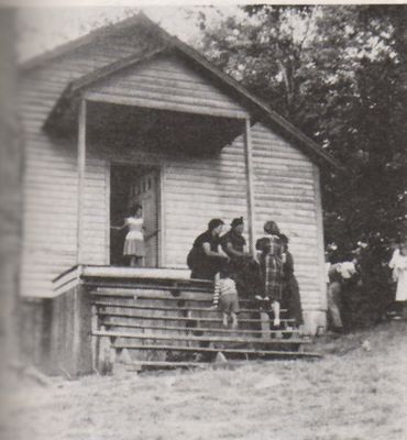 pondmtnchurch.jpg
This is a 1952 image of the church and some congregants on the porch.
