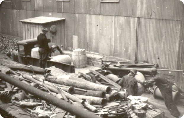 porterworkersbarrel.jpg
Photo by John Porter, courtesy of Doug Ogle, showing workers cleaning up debris, 1937-40.
