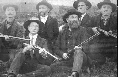 roberts1.jpg
Back row, left to right Garfield, Micajah, Glenn and Coy Roberts
Front row, Steve and Peter Kenly Roberts
The men holding guns are all Primitive Baptist Elders.  Courtesy of Thom Houk.
