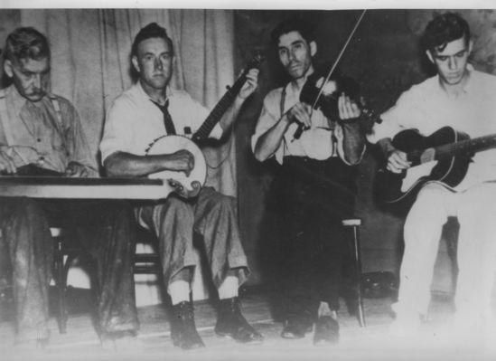 Russell Family Band
Left to right, Samuel Francis Russell, Worley Roland, Joe Russell, and Robert Russell.  Courtesy of Judy Powers.
