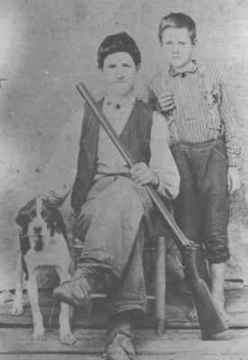 strugilljeike.jpg
Estil and Ike were sons of Joshua Sturgill and Phoebe Marilda Weaver Sturgill.  The dog's parents are unknown.  This photo was taken about 1898.  
