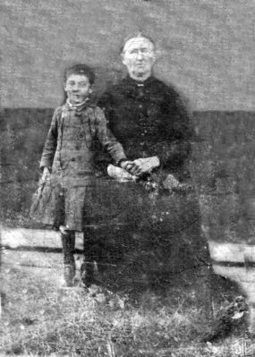 Perkins Mother and Child?
Here is an old "tintype" picture which was in with the Perkins bunch.  No idea who they are but am guessing this to be civil war era or somewhat later.   Courtesy of Cathy Bell [email]cjbell47@goldenwest.net[/email]

