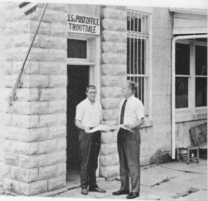 Troutdale Post Office
This photo shows postmaster Don Young (left) talking with Congressman Daniel about plans for a new post office.
