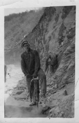 Doughton Park - Bustin' Rock
This early 1940s photo shows Arthur F. Weaver operating a jackhammer during the construction of the Blue Ridge Parkway.
