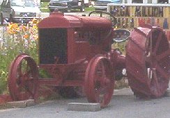 redtractor.jpg
This antique red tractor was sitting beside the road when I took the picture in the summer of 2003.
